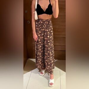 Billabong flowy black pants with flower design - size small